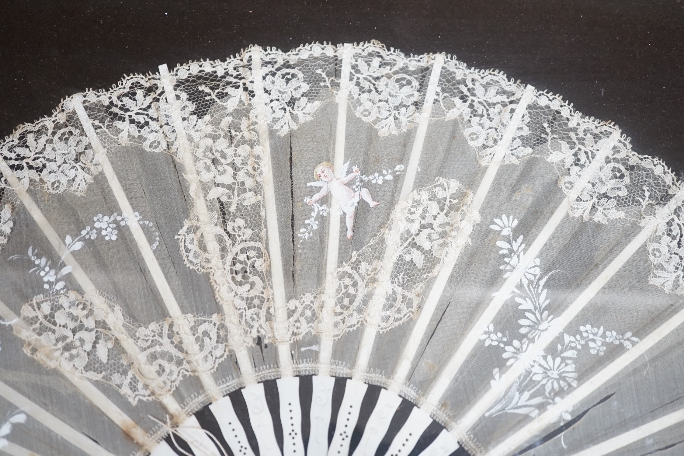 A pair of 19th century cased bone and painted lace fans, 40cm long excl frame